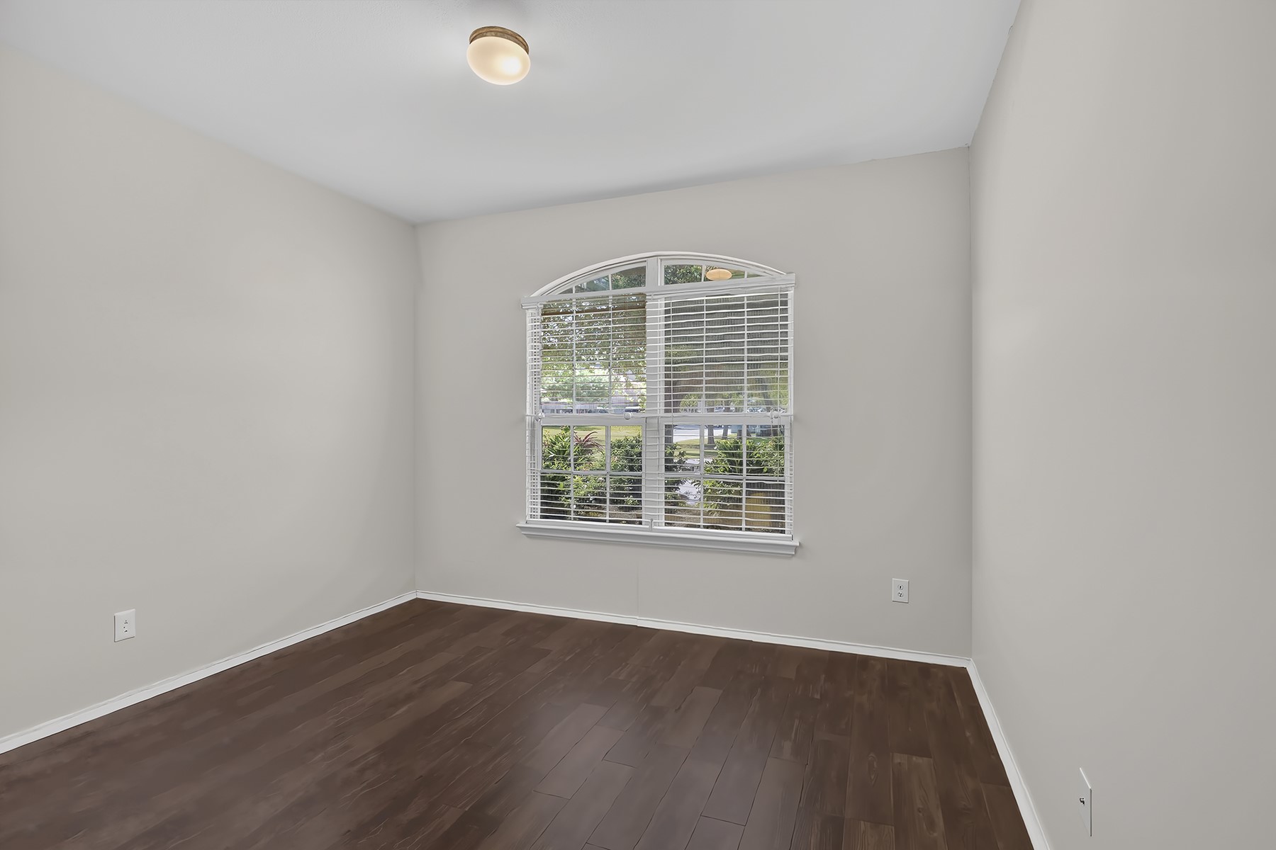 4601 Chestnut Meadows Bend Georgetown, TX 78626 - Photo 13 of 35 Rich hardwood-style flooring and a generously sized window define this inviting room.