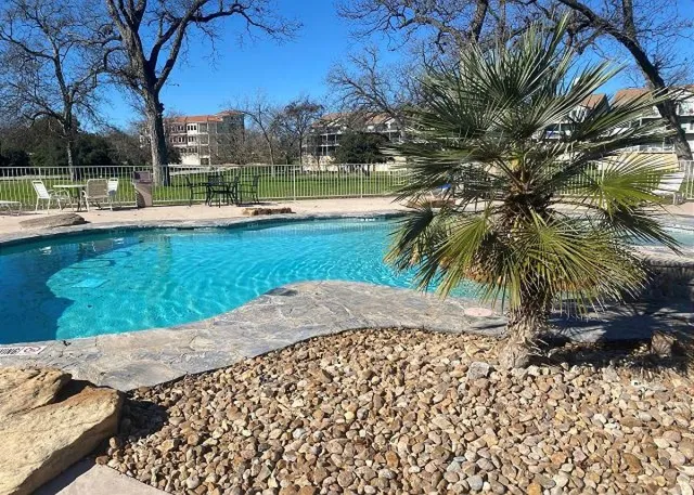 a view of a yard with a fountain