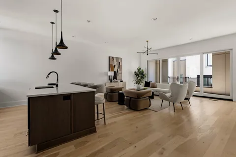 a bedroom with a bed and a couch