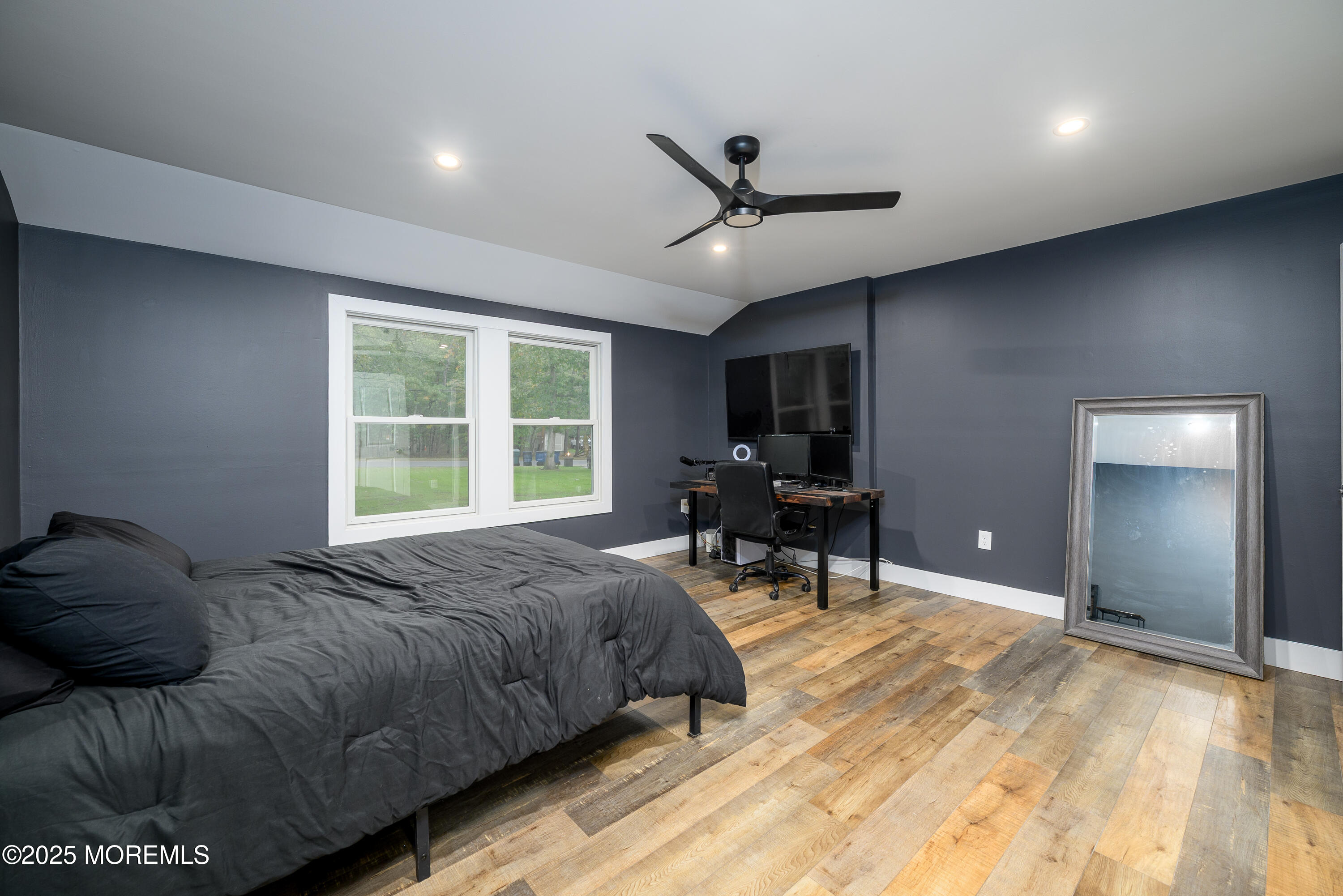 453 Stage Road Little Egg Harbor, NJ 08087 - Photo 22 of 52 a spacious bedroom with a bed and a large window