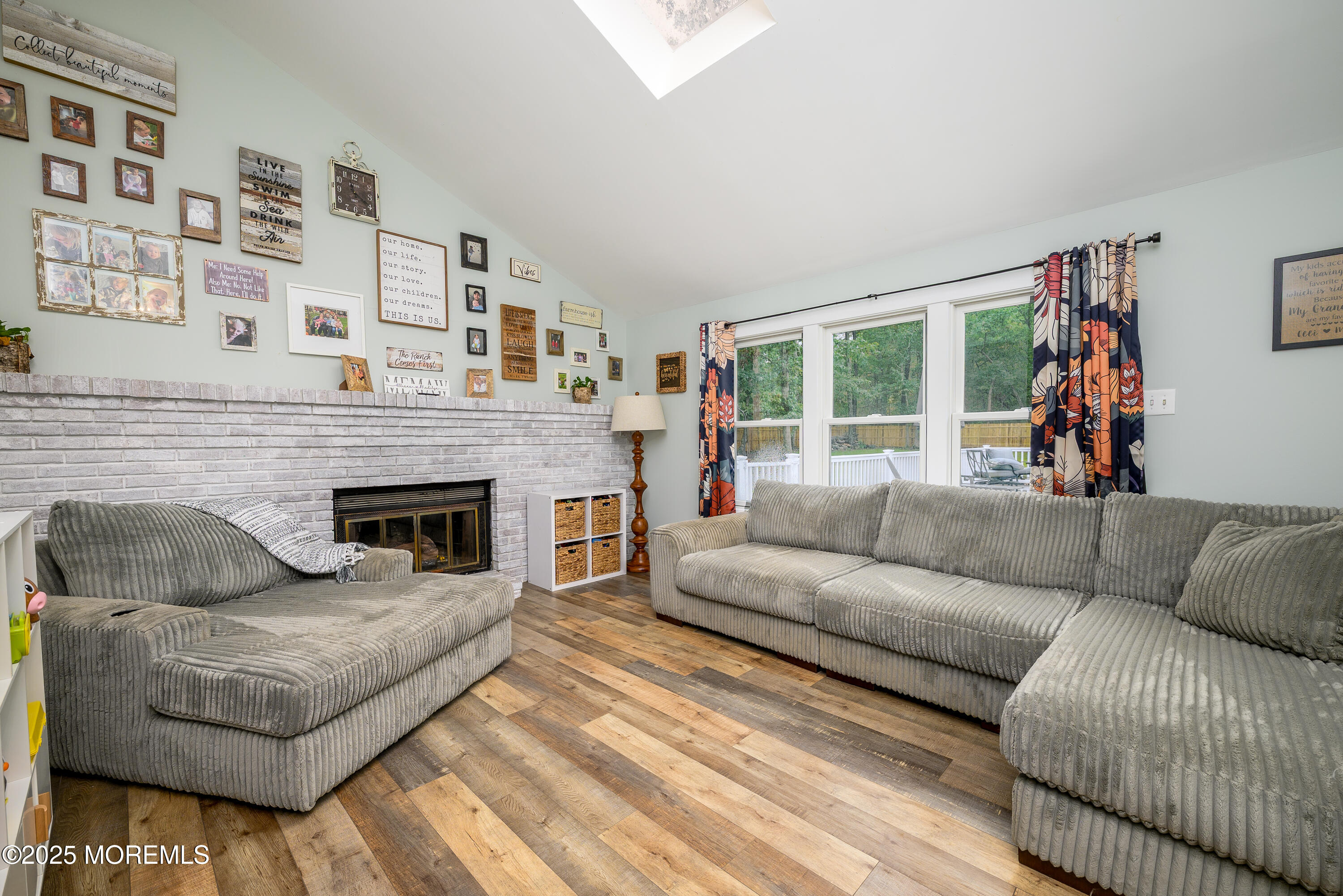 453 Stage Road Little Egg Harbor, NJ 08087 - Photo 27 of 52 a living room with furniture and a fireplace