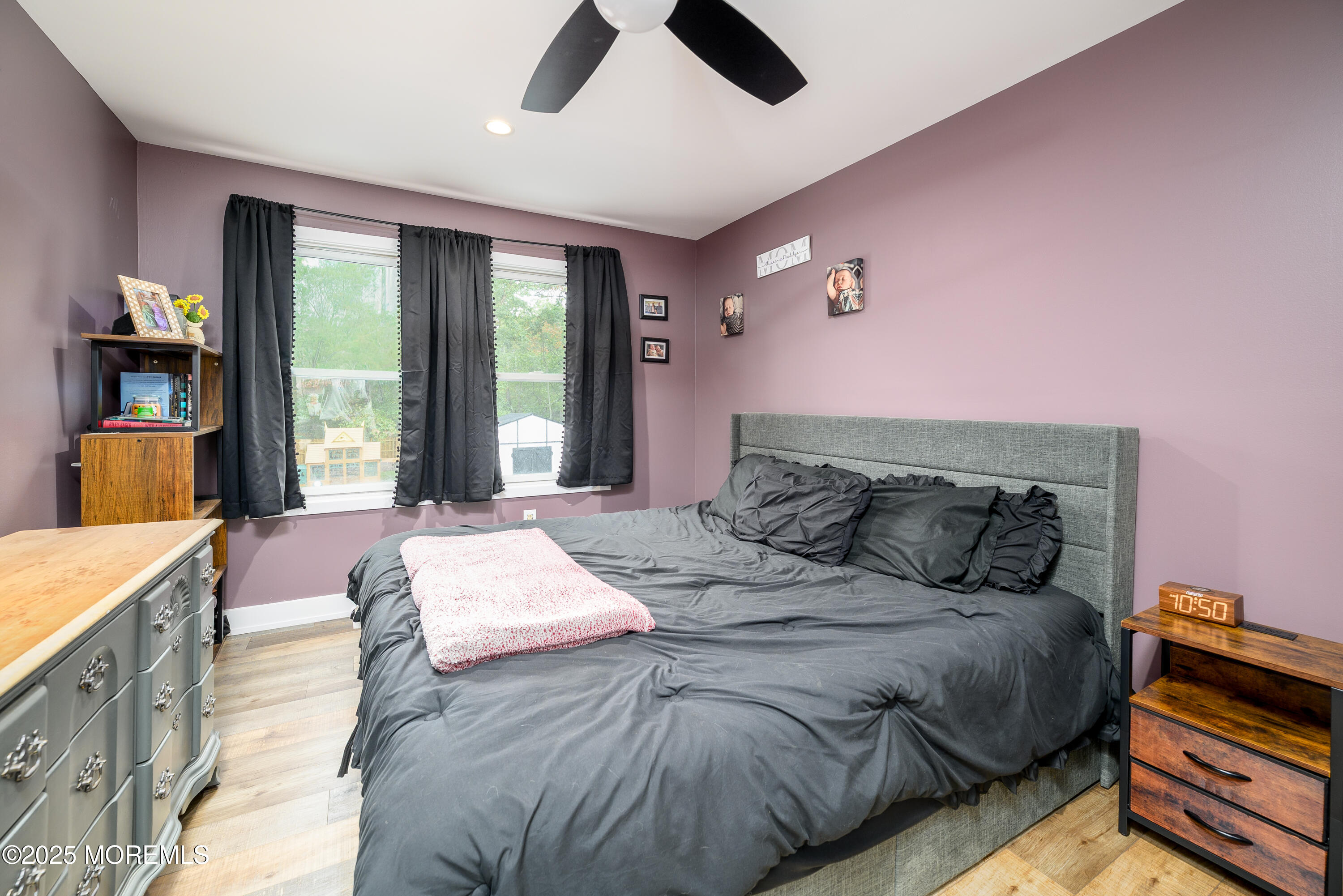 453 Stage Road Little Egg Harbor, NJ 08087 - Photo 39 of 52 a bed sitting in a bedroom next to a window