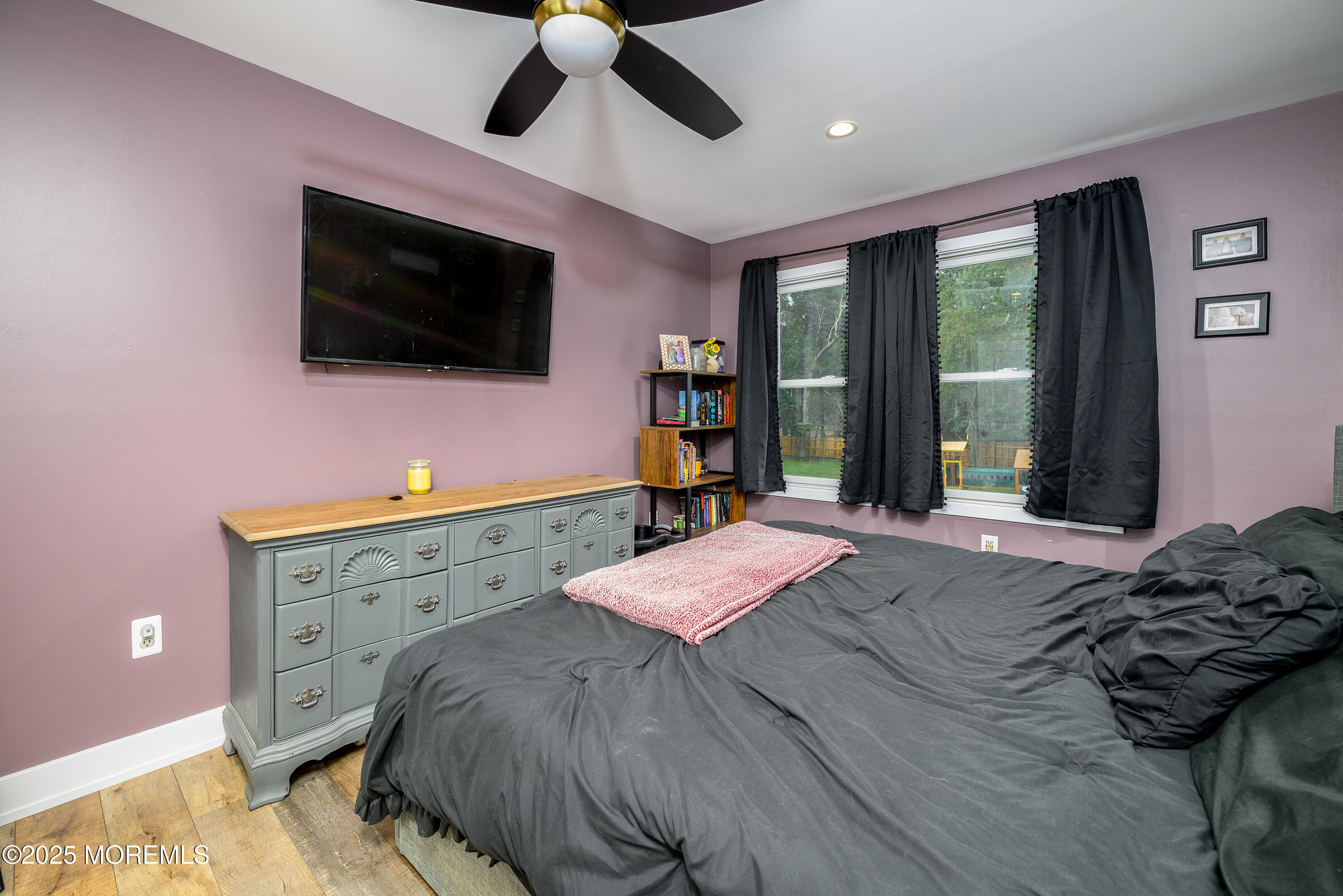 453 Stage Road Little Egg Harbor, NJ 08087 - Photo 40 of 52 a bed room with a bed and flat screen tv