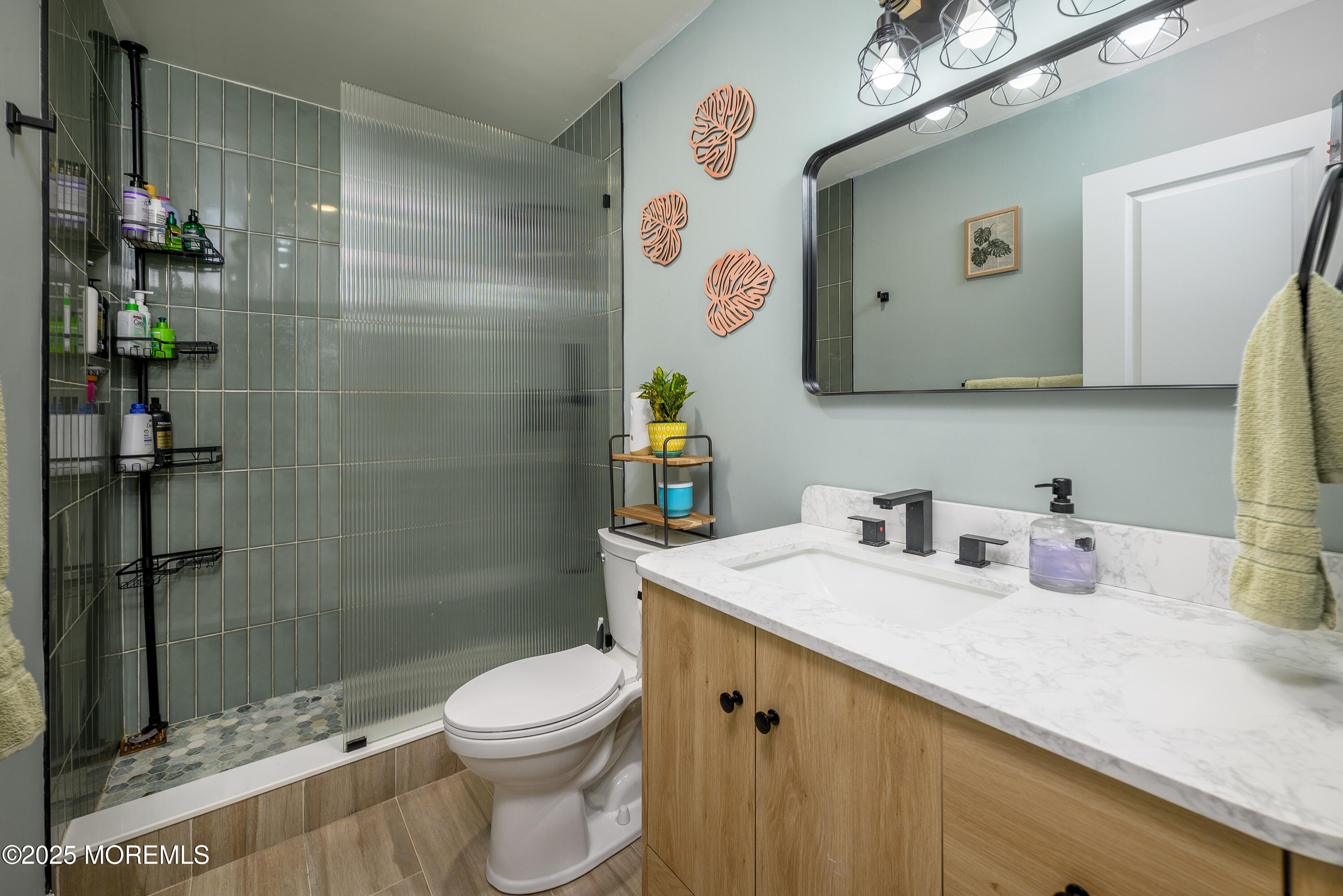 453 Stage Road Little Egg Harbor, NJ 08087 - Photo 41 of 52 a bathroom with a sink a toilet and shower