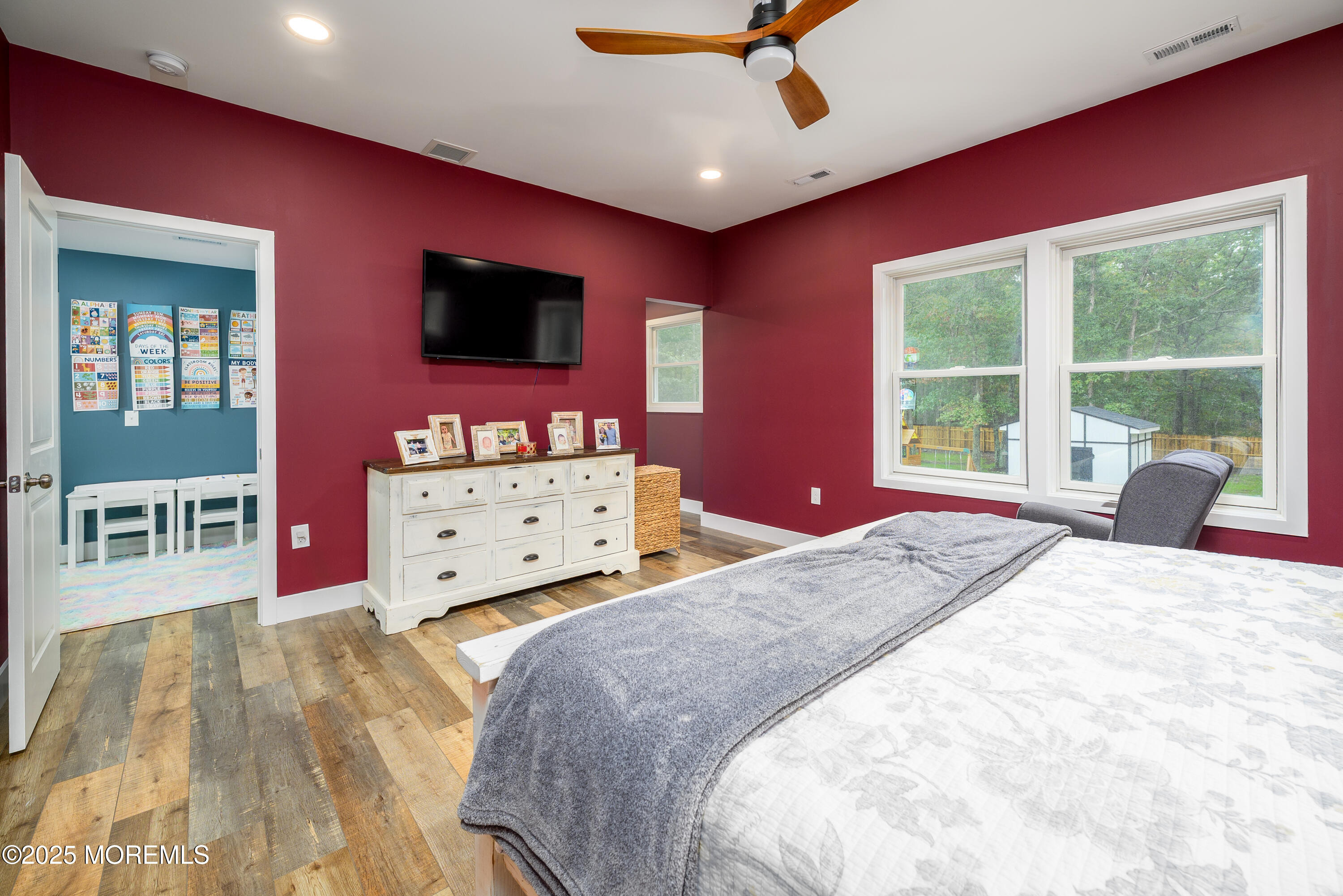 453 Stage Road Little Egg Harbor, NJ 08087 - Photo 45 of 52 a bedroom with a bed and a flat screen tv