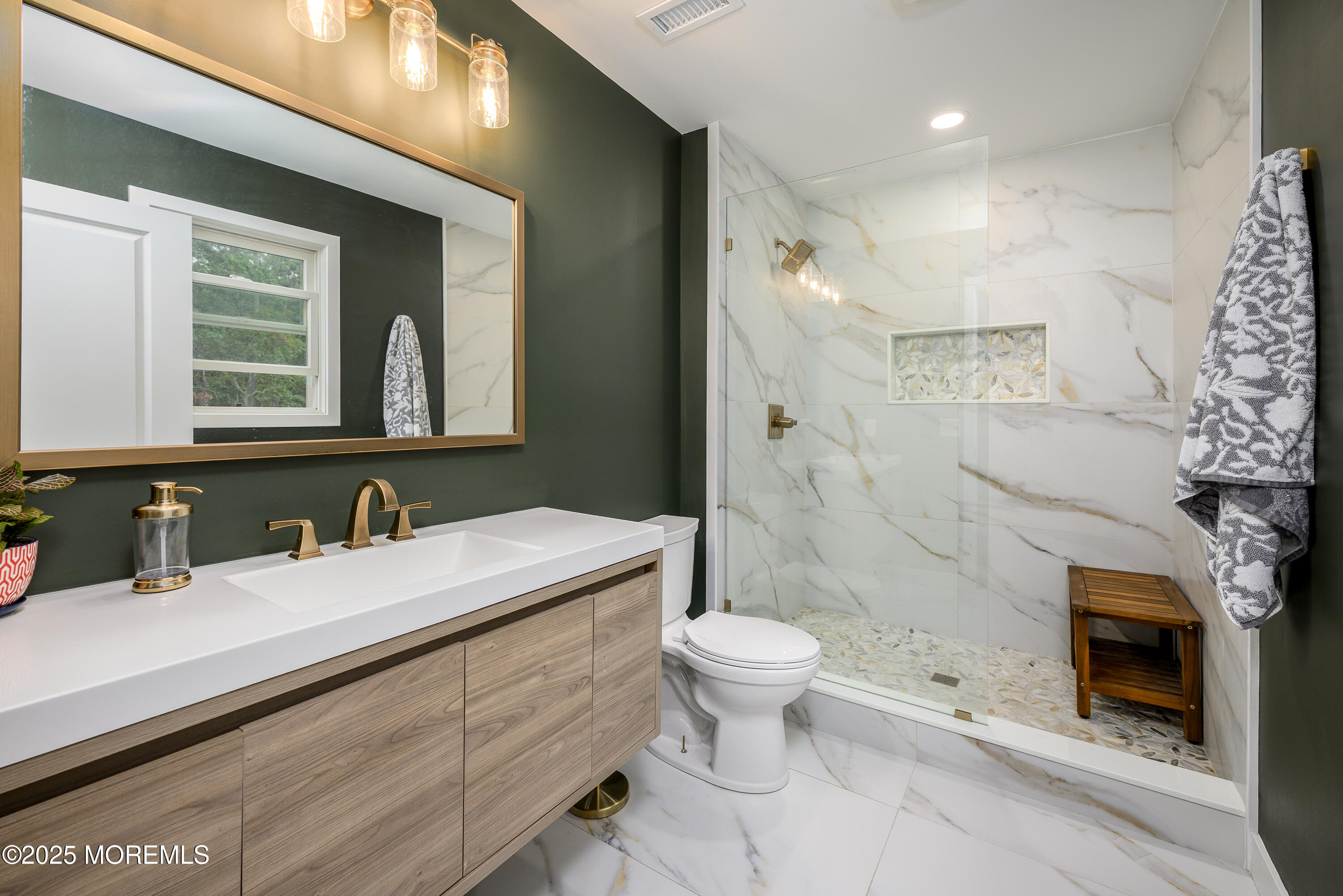 453 Stage Road Little Egg Harbor, NJ 08087 - Photo 47 of 52 a bathroom with a sink a toilet and shower