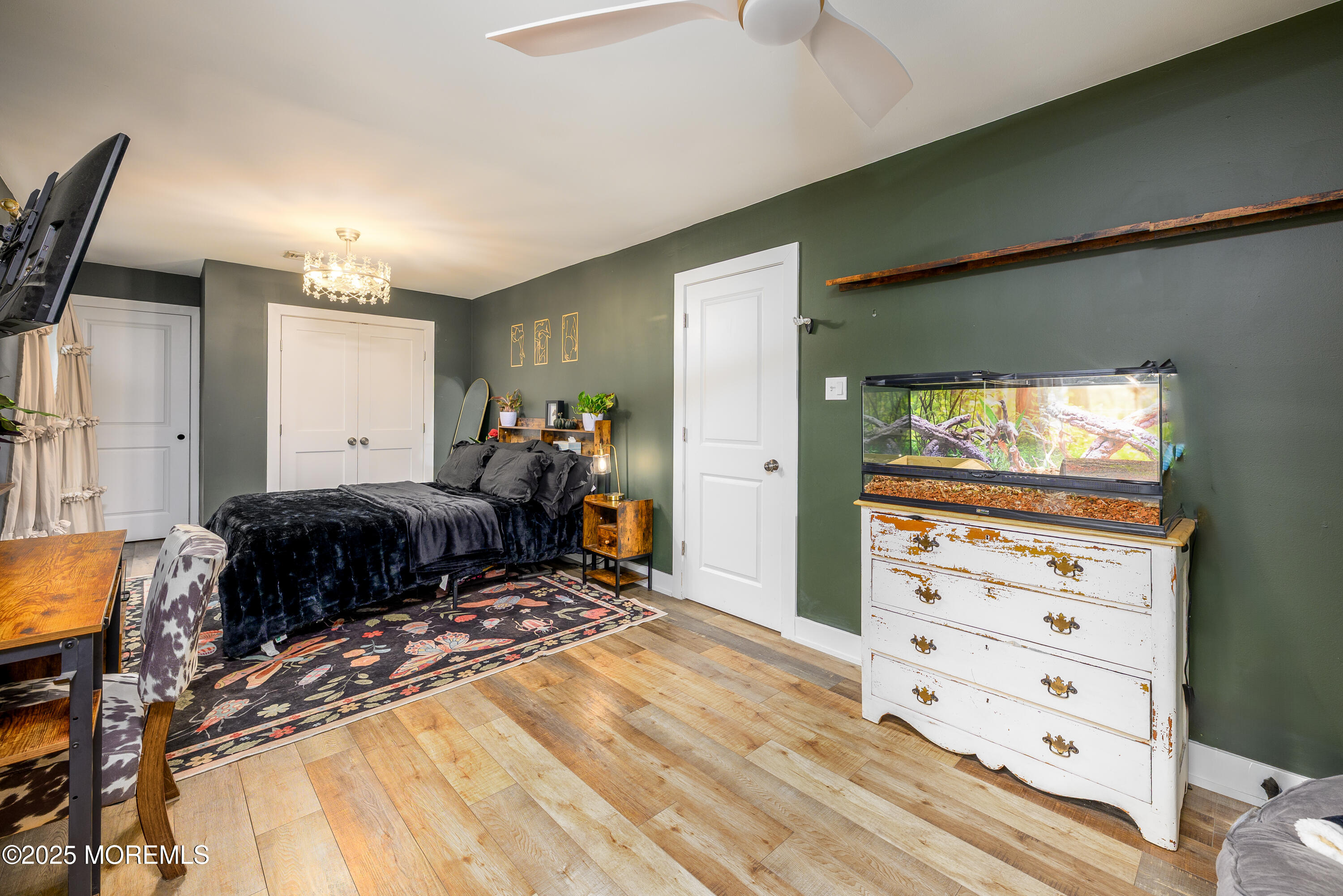 453 Stage Road Little Egg Harbor, NJ 08087 - Photo 52 of 52 a bed room with a bed and a television