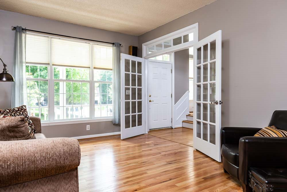 9501 Miranda Drive Raleigh, NC 27617 - Photo 11 of 30 Grand entry from the foyer through french doors! Living Room
