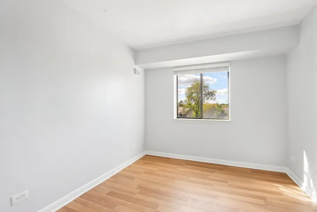 a view of a street from a balcony