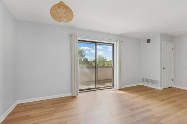 a kitchen with cabinets appliances and a sink