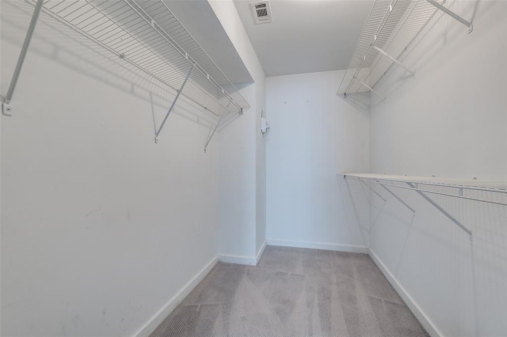 4231 Travis Street, Unit 20 Dallas, TX 75205 - Photo 16 of 23 a view of a room with racks on the wall