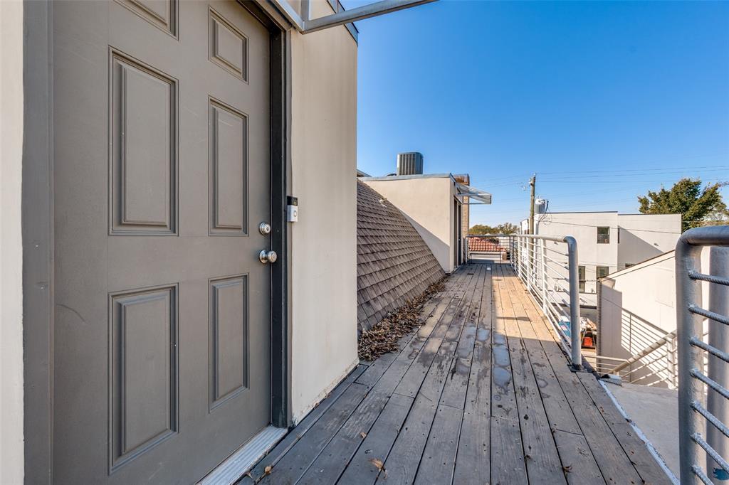 4231 Travis Street, Unit 20 Dallas, TX 75205 - Photo 23 of 23 a view of balcony and deck with wooden floor