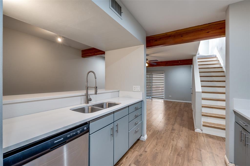 4231 Travis Street, Unit 20 Dallas, TX 75205 - Photo 6 of 23 a kitchen with a sink and cabinets
