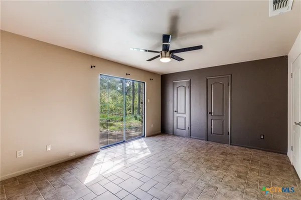 a view of a porch with a door and balcony