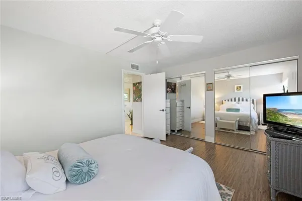 a view of a building with a yard