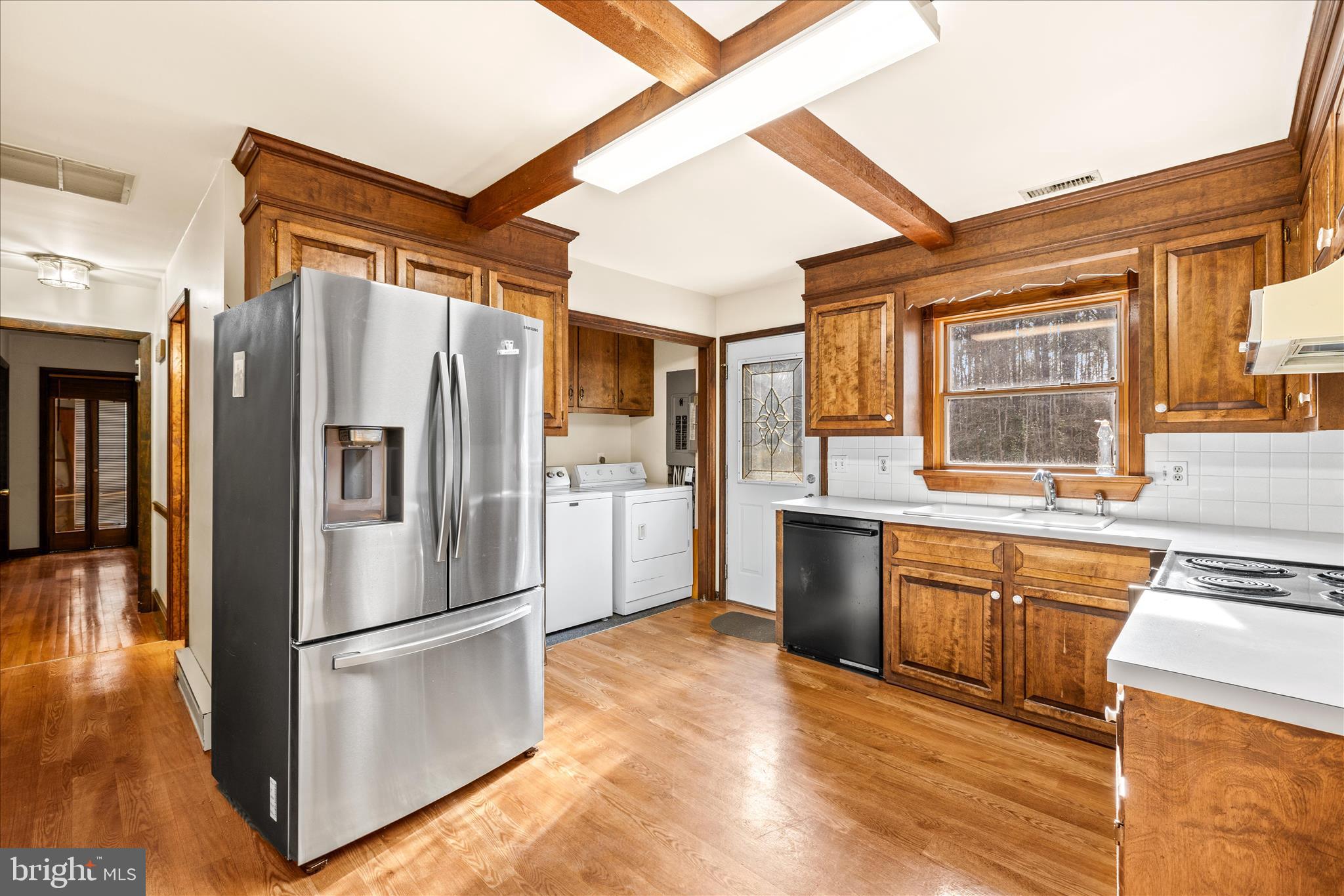 4170 Coulbourn Mill Road Salisbury, MD 21804 - Photo 17 of 47 a kitchen with stainless steel appliances a refrigerator stove and sink