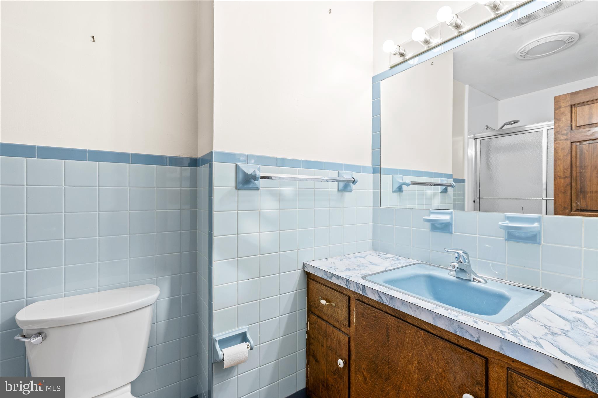 4170 Coulbourn Mill Road Salisbury, MD 21804 - Photo 24 of 47 a bathroom with a granite countertop sink a toilet and shower