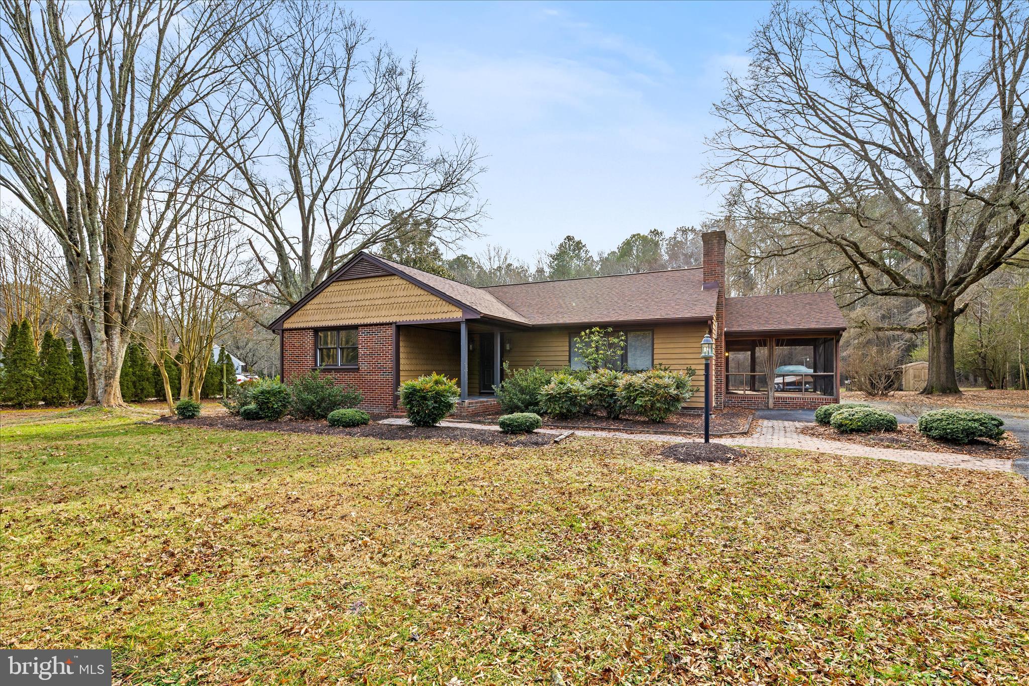4170 Coulbourn Mill Road Salisbury, MD 21804 - Photo 3 of 47 a front view of a house with a yard and seating area