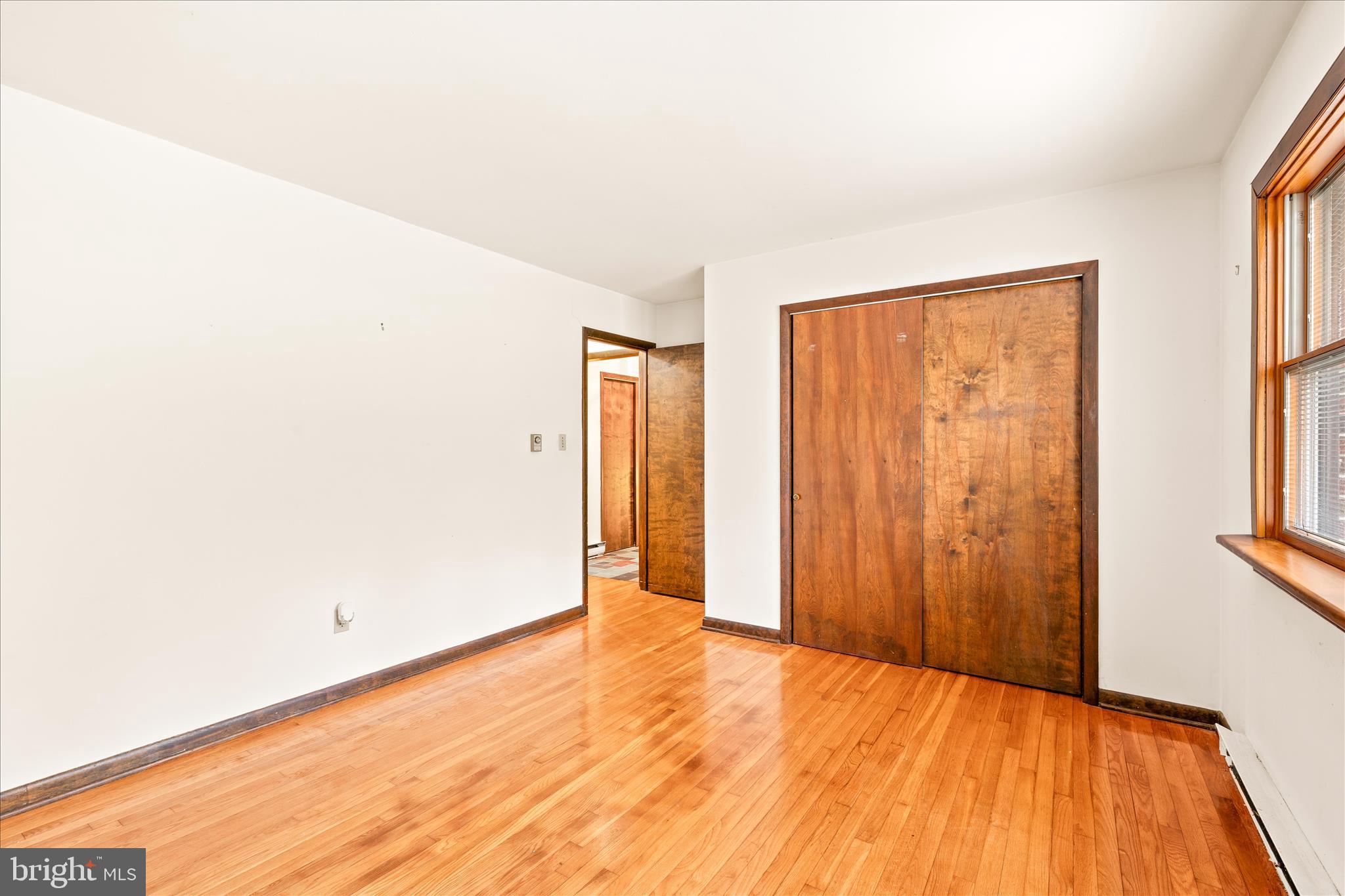 4170 Coulbourn Mill Road Salisbury, MD 21804 - Photo 36 of 47 a view of an empty room with wooden floor