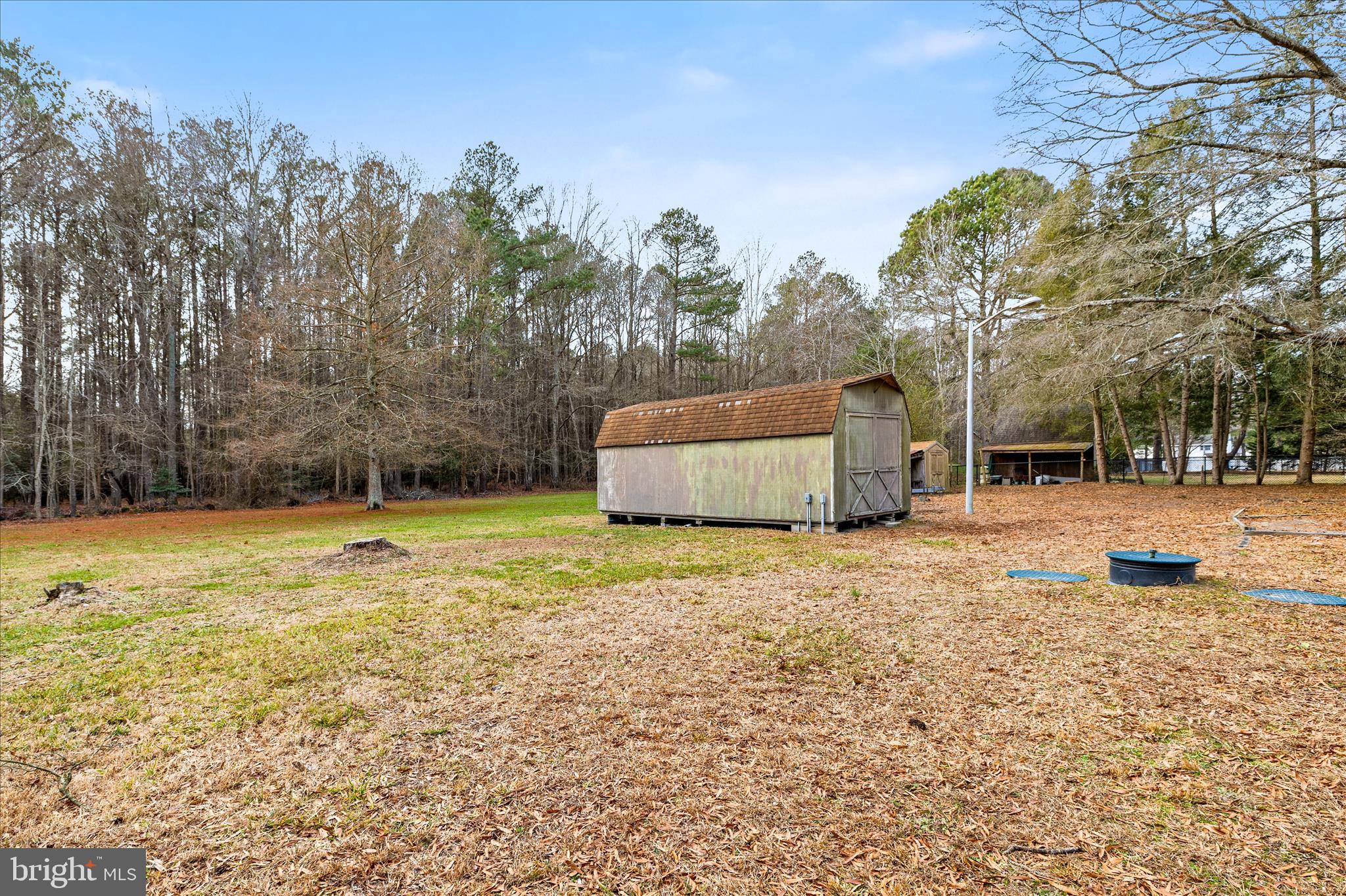 4170 Coulbourn Mill Road Salisbury, MD 21804 - Photo 40 of 47 a swimming pool with outdoor seating and yard