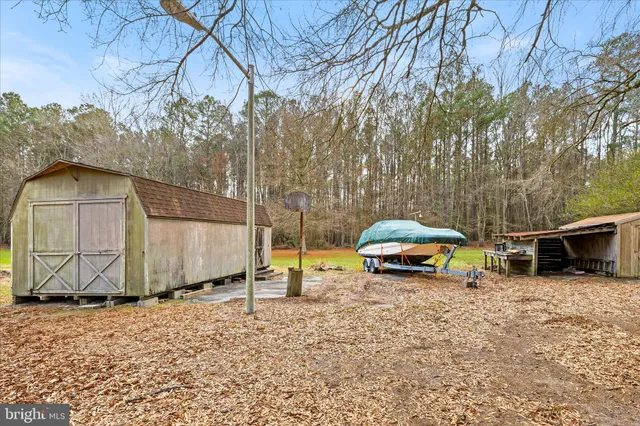 a living room with furniture fireplace and flat screen tv