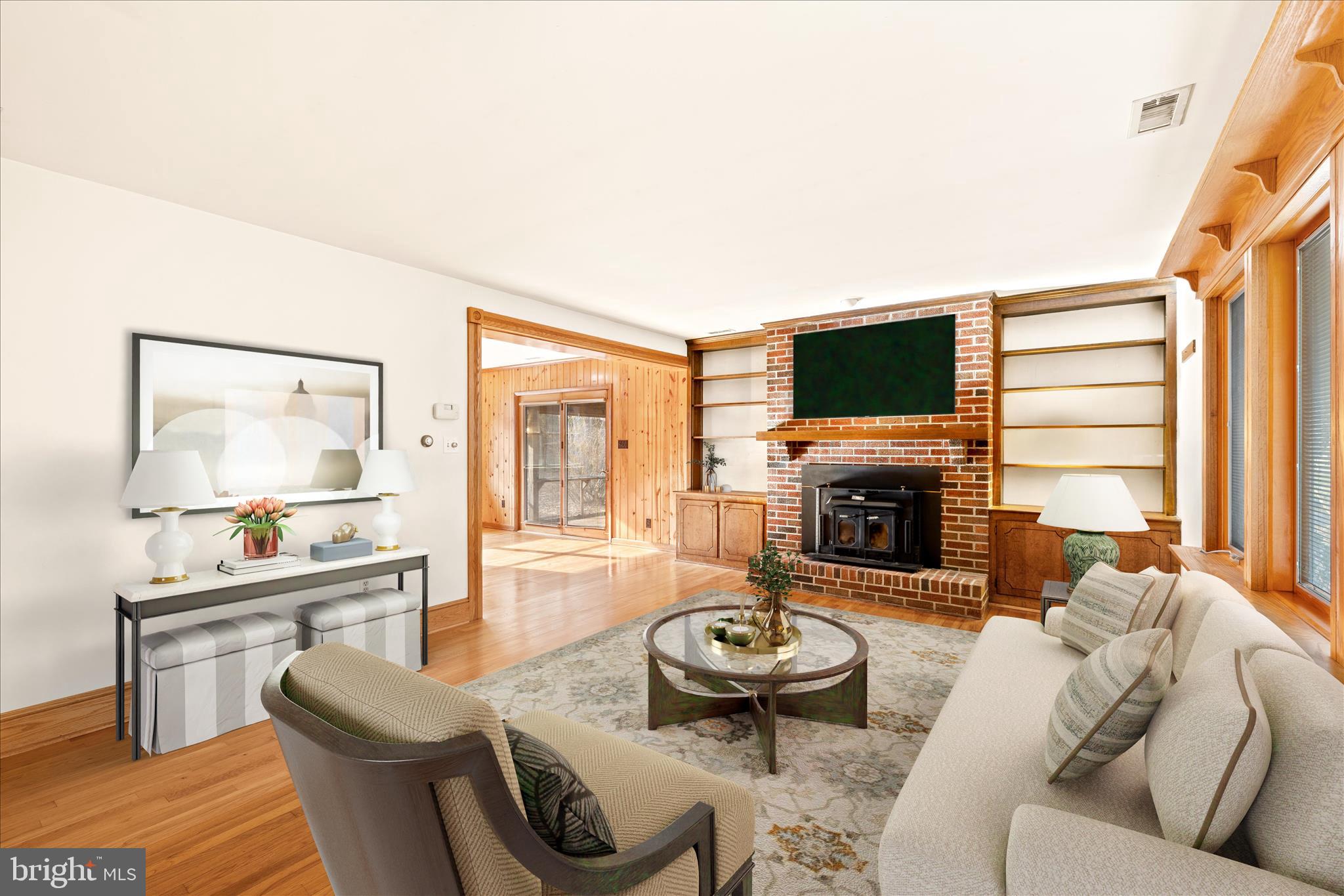 4170 Coulbourn Mill Road Salisbury, MD 21804 - Photo 45 of 47 a living room with furniture fireplace and flat screen tv