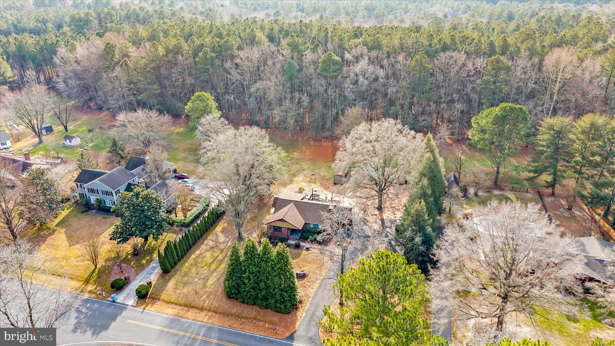 4170 Coulbourn Mill Road Salisbury, MD 21804 - Photo 5 of 47 a aerial view of a house with a yard and lake view