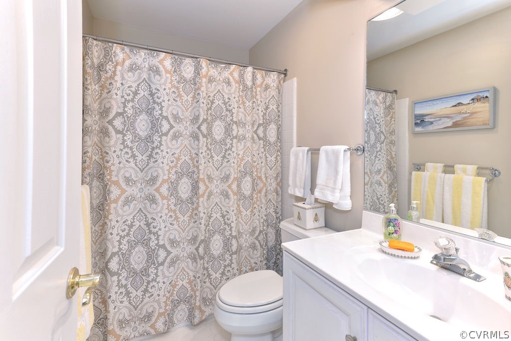 104 The Green Williamsburg, VA 23185 - Photo 28 of 50 a bathroom with a sink toilet and shower