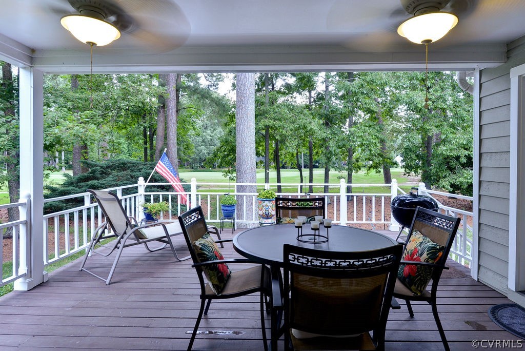 104 The Green Williamsburg, VA 23185 - Photo 29 of 50 a view of a dining room with furniture window and wooden floor