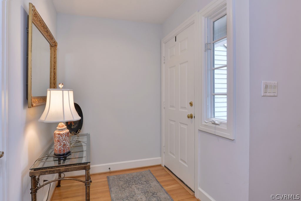 104 The Green Williamsburg, VA 23185 - Photo 3 of 50 a view of a room with a window and hardwood floor