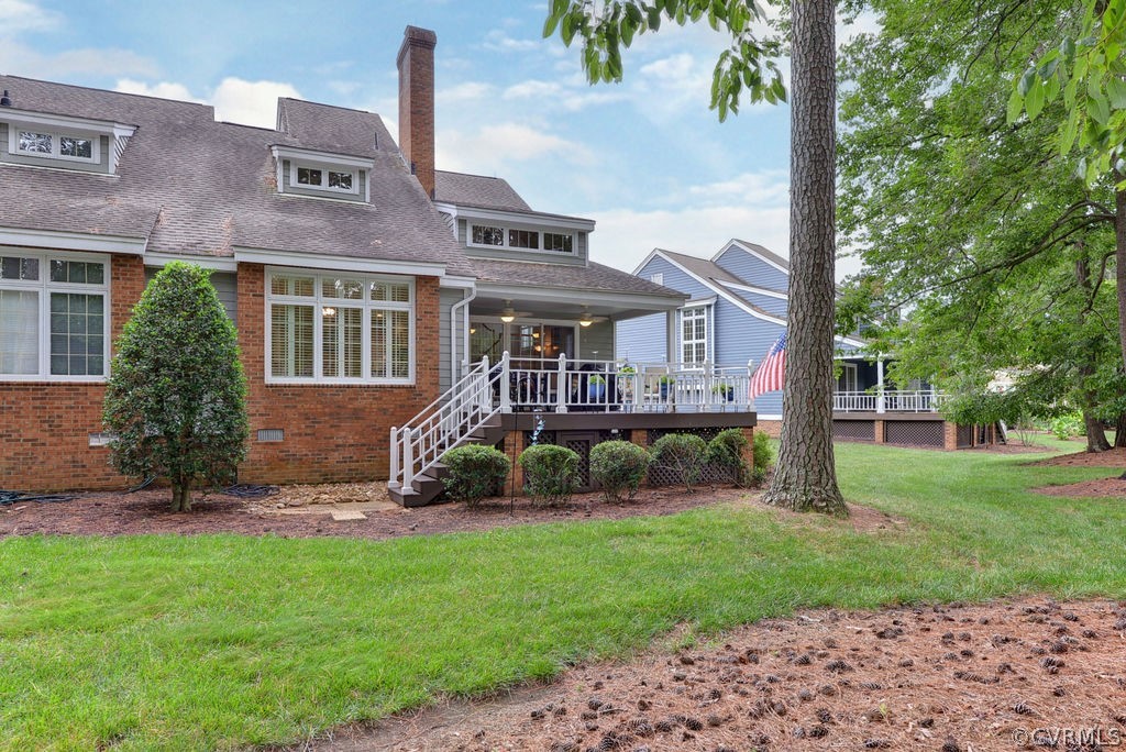 104 The Green Williamsburg, VA 23185 - Photo 33 of 50 a front view of a house with garden