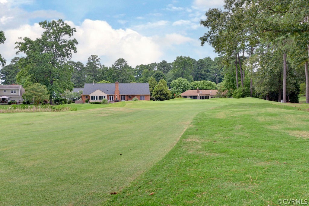 104 The Green Williamsburg, VA 23185 - Photo 35 of 50 a view of a big yard with plants and large trees