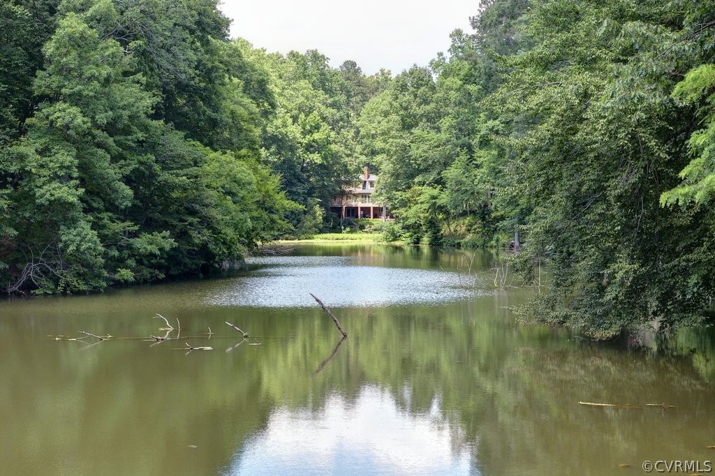 104 The Green Williamsburg, VA 23185 - Photo 48 of 50 a view of a lake view with houses in back