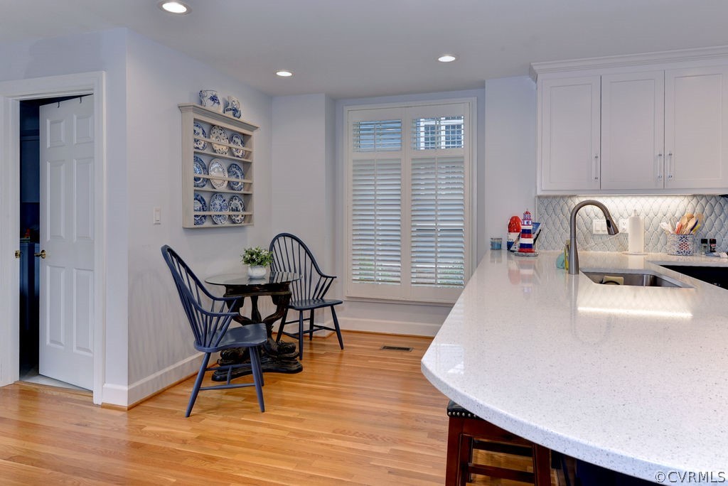 104 The Green Williamsburg, VA 23185 - Photo 10 of 50 a dining room with furniture and wooden floor
