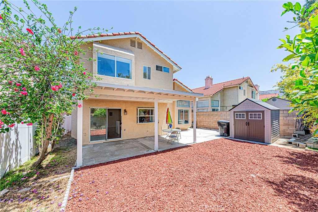 15377 Tobarra Road Fontana, CA 92337 - Photo 31 of 38 Beautiful backyard offering several fruit trees and a peaceful setting