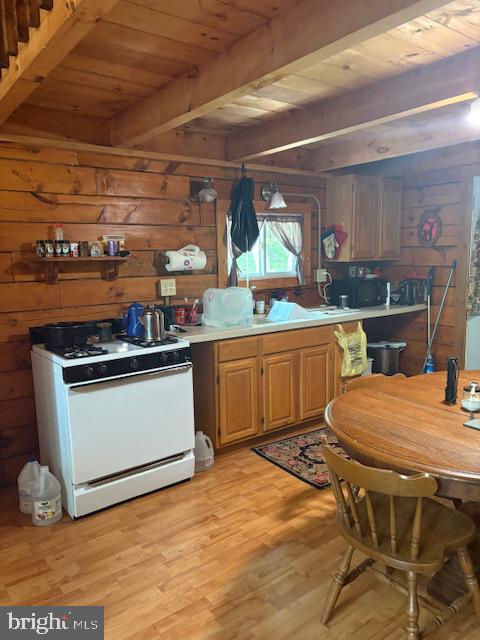 557 11 Road Clarence, PA 16829 - Photo 9 of 22 Cozy cabin kitchen with rustic charm.