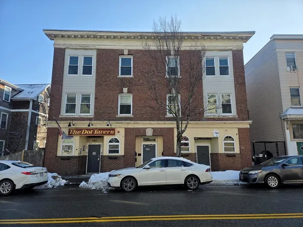 a car parked in front of a building