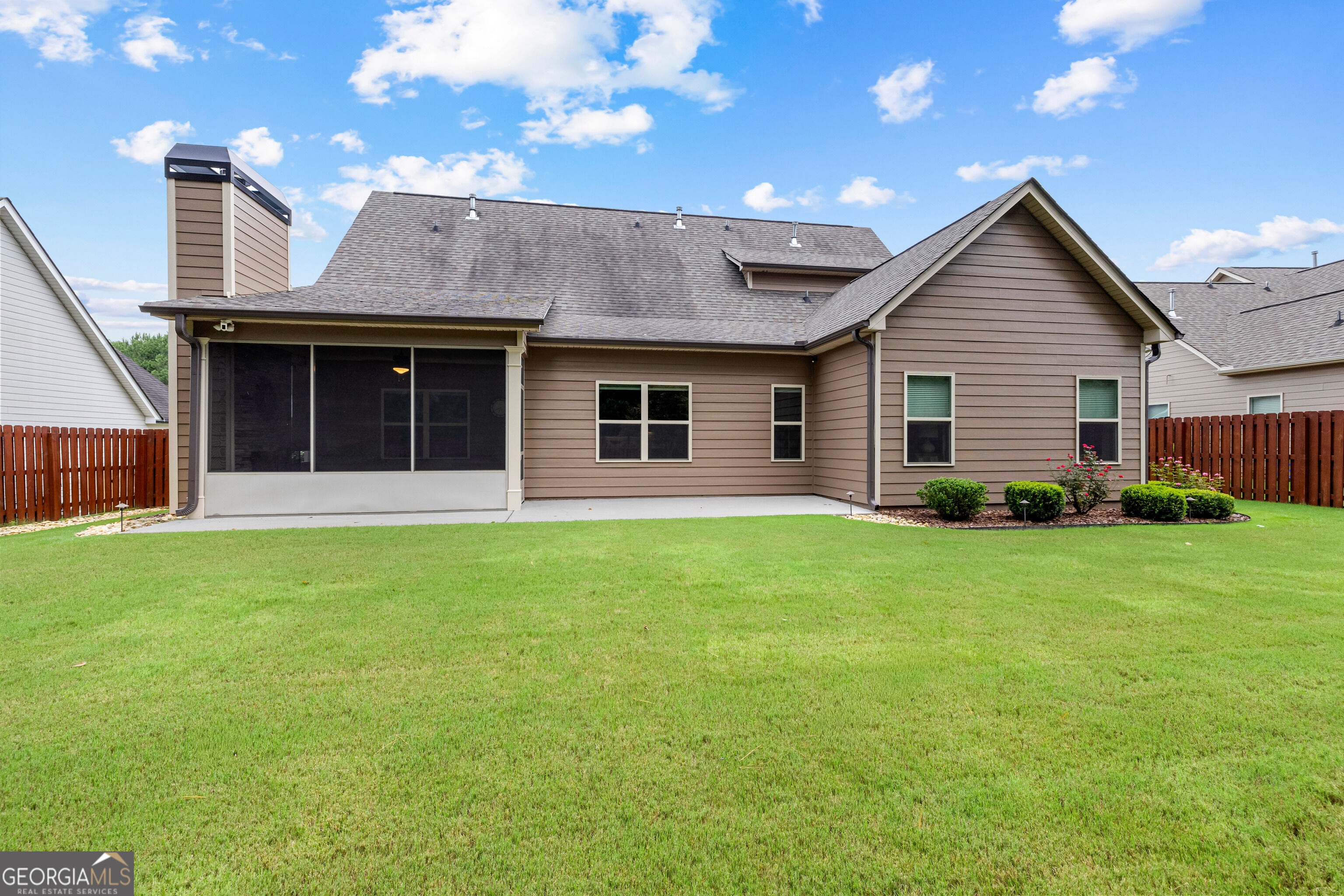 12 Delaware Way Newnan, GA 30265 - Photo 51 of 61 Rear exterior featuring a screened patio and covered outdoor living space.