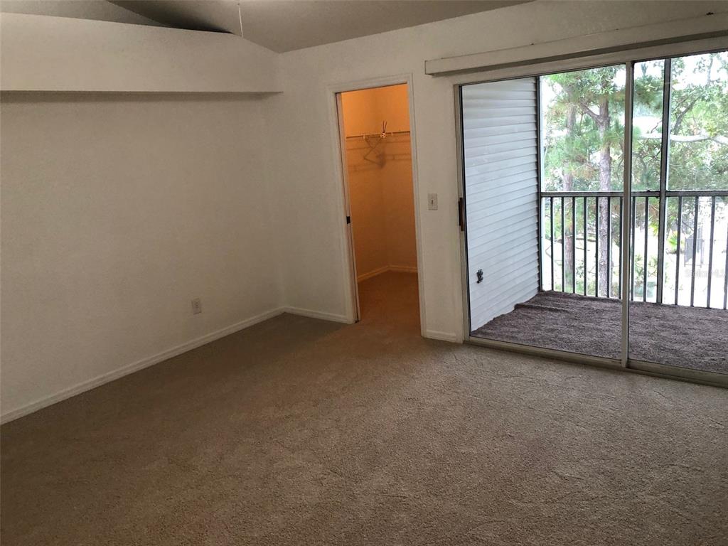 9720 Indian Key Trail, Unit 117 Seminole, FL 33776 - Photo 33 of 92 a view of a room with a large window