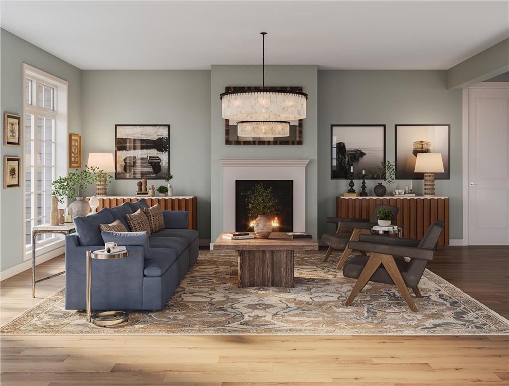 102 Ramsgate Road, Unit WARRINGTON Cranberry Township, PA 16066 - Photo 11 of 42 a living room with furniture and a fireplace