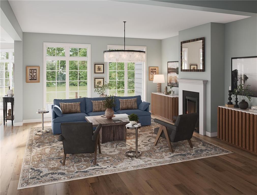 102 Ramsgate Road, Unit WARRINGTON Cranberry Township, PA 16066 - Photo 12 of 42 a living room with furniture a window and a fireplace
