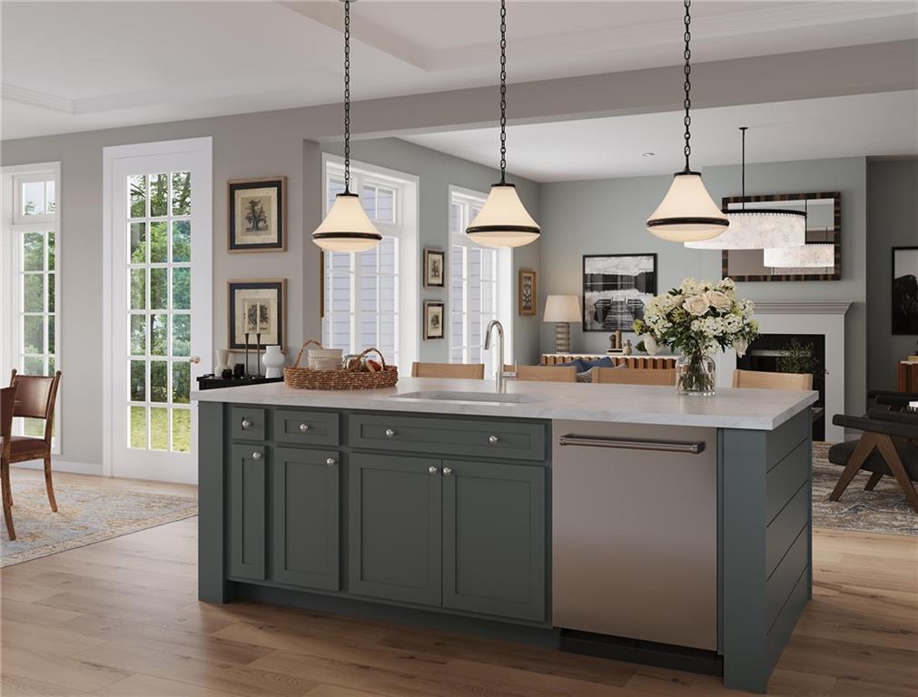 102 Ramsgate Road, Unit WARRINGTON Cranberry Township, PA 16066 - Photo 18 of 42 a kitchen with a sink and chandelier
