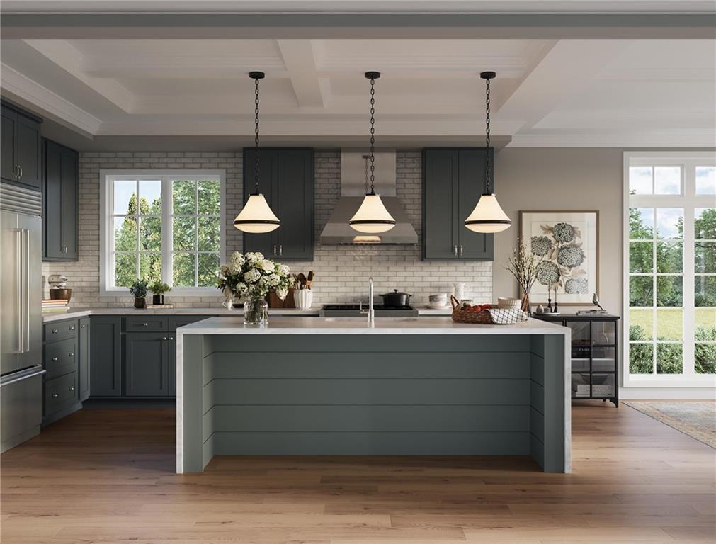102 Ramsgate Road, Unit WARRINGTON Cranberry Township, PA 16066 - Photo 22 of 42 a kitchen with stainless steel appliances granite countertop a sink a stove and a wooden floors