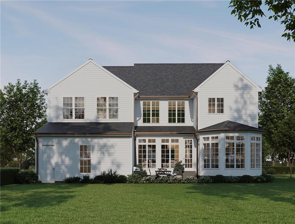 102 Ramsgate Road, Unit WARRINGTON Cranberry Township, PA 16066 - Photo 32 of 42 a front view of a house with a yard table and fountain