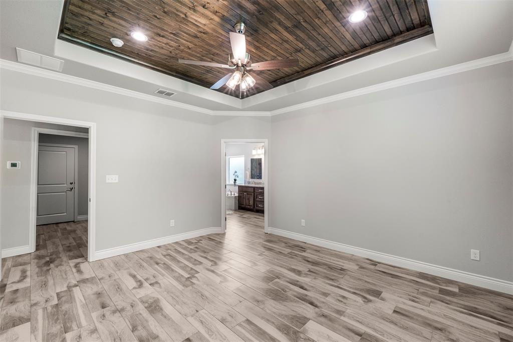 10301 Ravenswood Road Granbury, TX 76049 - Photo 24 of 38 Woodwork on ceiling