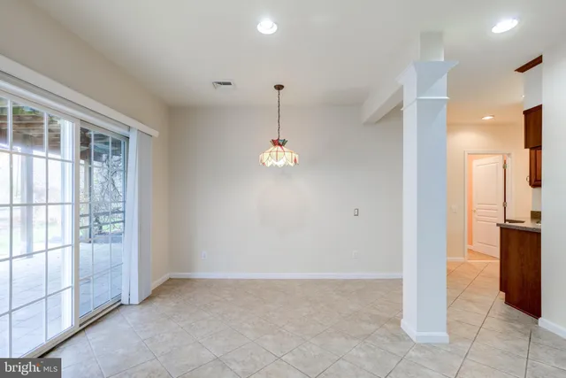 a kitchen with stainless steel appliances a sink a refrigerator and a stove