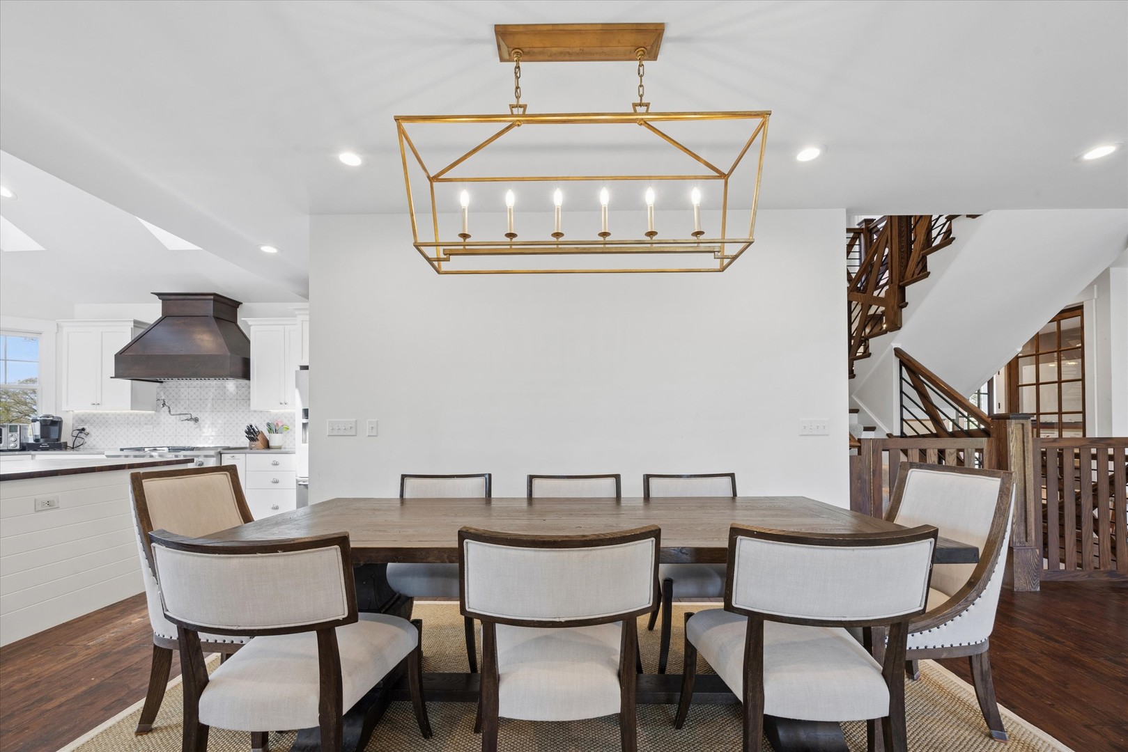 16W185 89th Street Burr Ridge, IL 60527 - Photo 11 of 44 a view of a dining room with furniture and wooden floor
