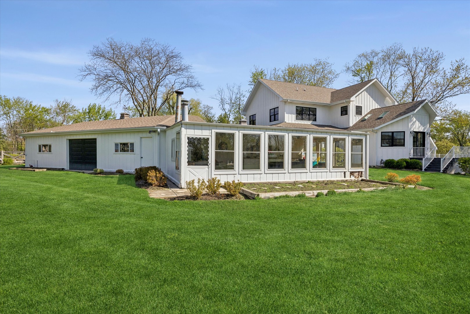 16W185 89th Street Burr Ridge, IL 60527 - Photo 35 of 44 a view of a house with a yard