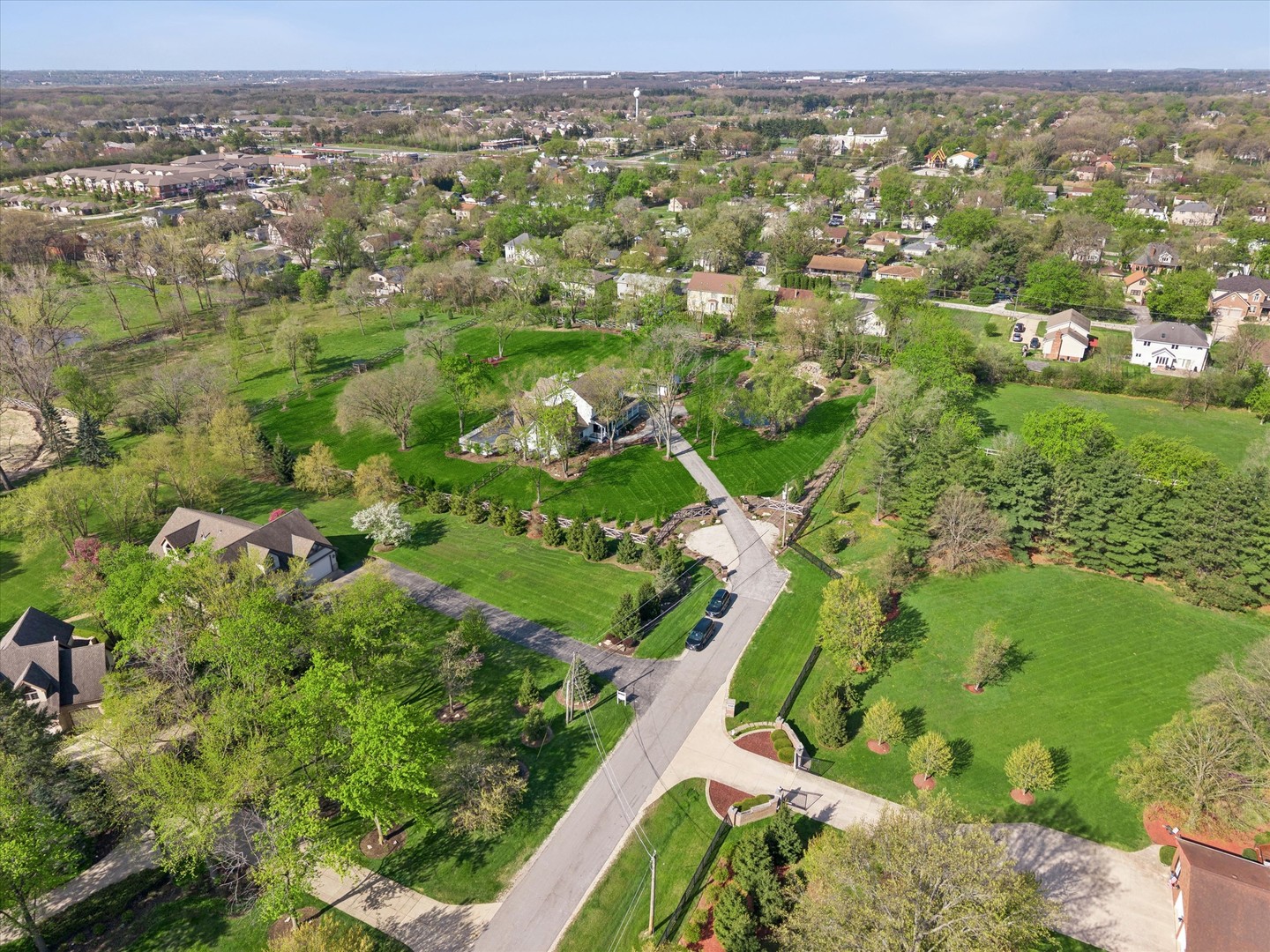 16W185 89th Street Burr Ridge, IL 60527 - Photo 39 of 44 an aerial view of residential houses with outdoor space