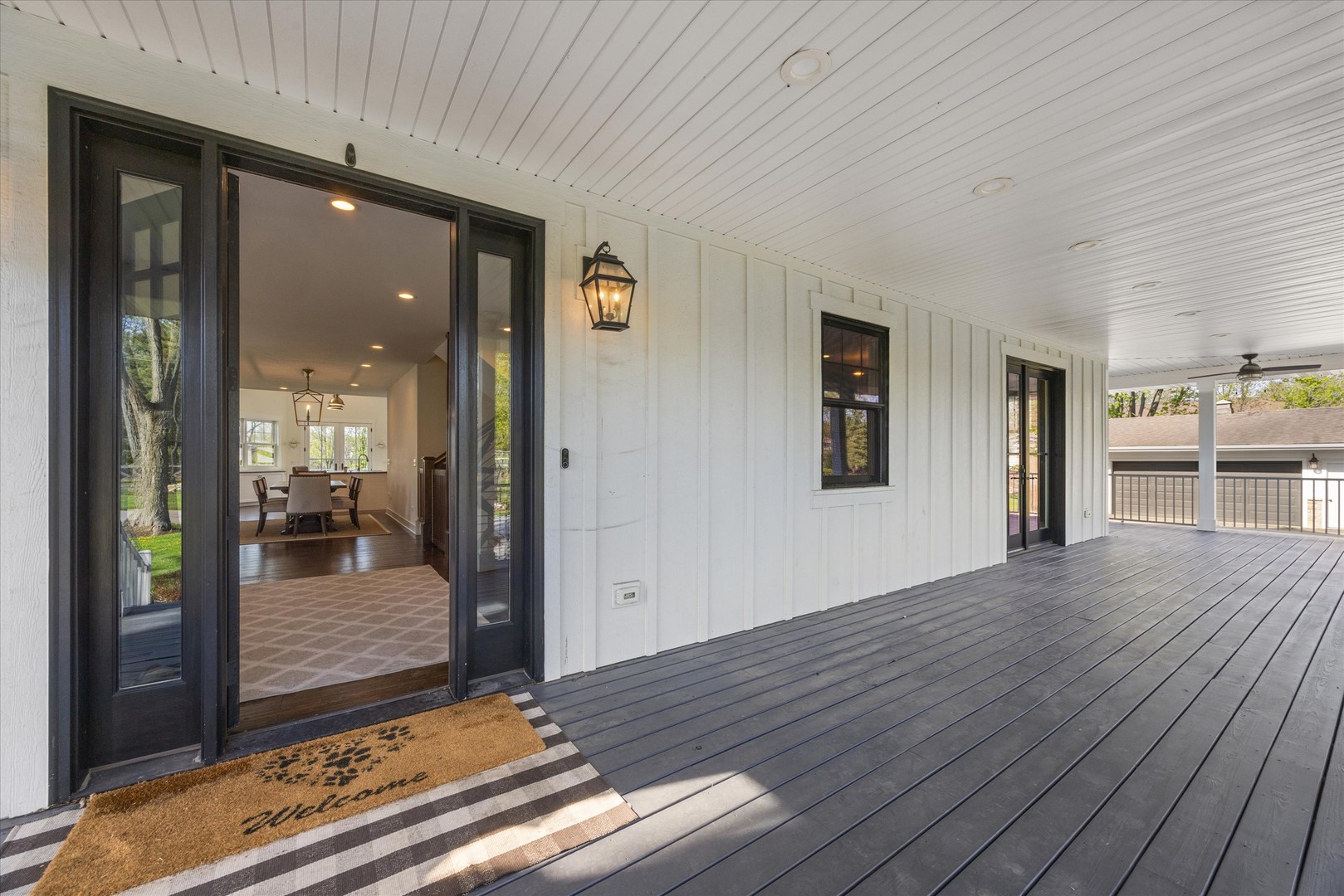 16W185 89th Street Burr Ridge, IL 60527 - Photo 4 of 44 a view of a hallway with wooden floor and windows